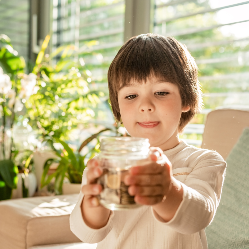 A child holding a jar of coins for an estimation activity for kids