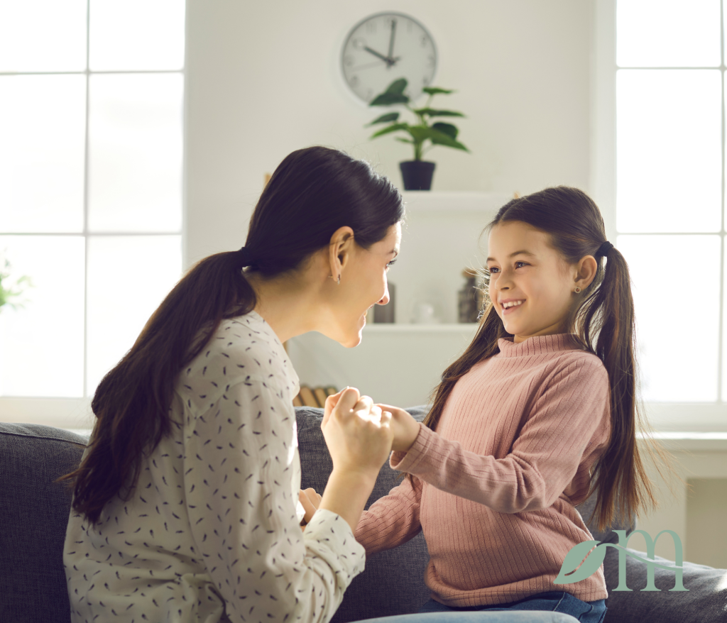 parent and child completing a material-free Montessori activity